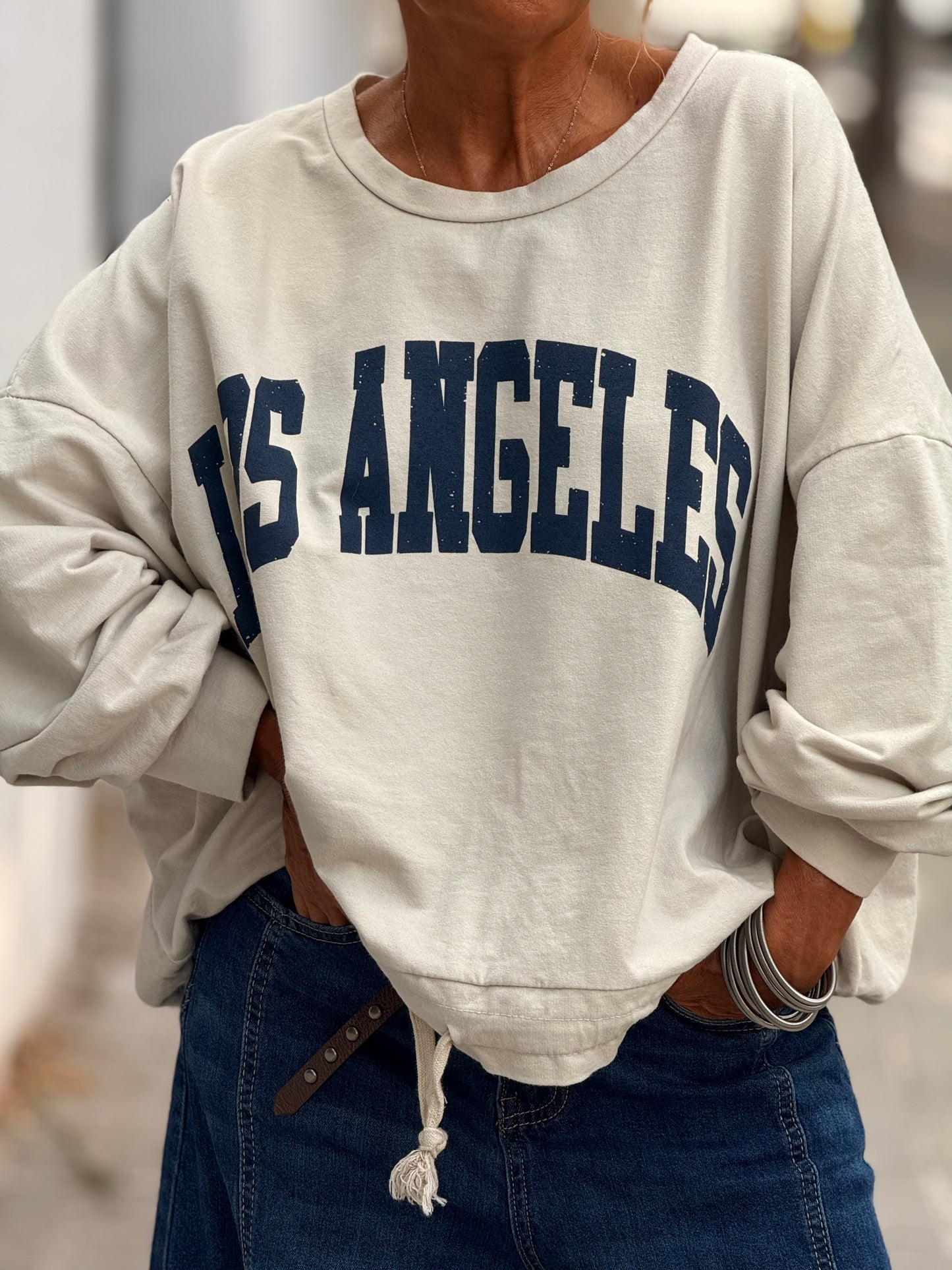 SUDADERA LOS ANGELES CON CORDÓN BEIGE