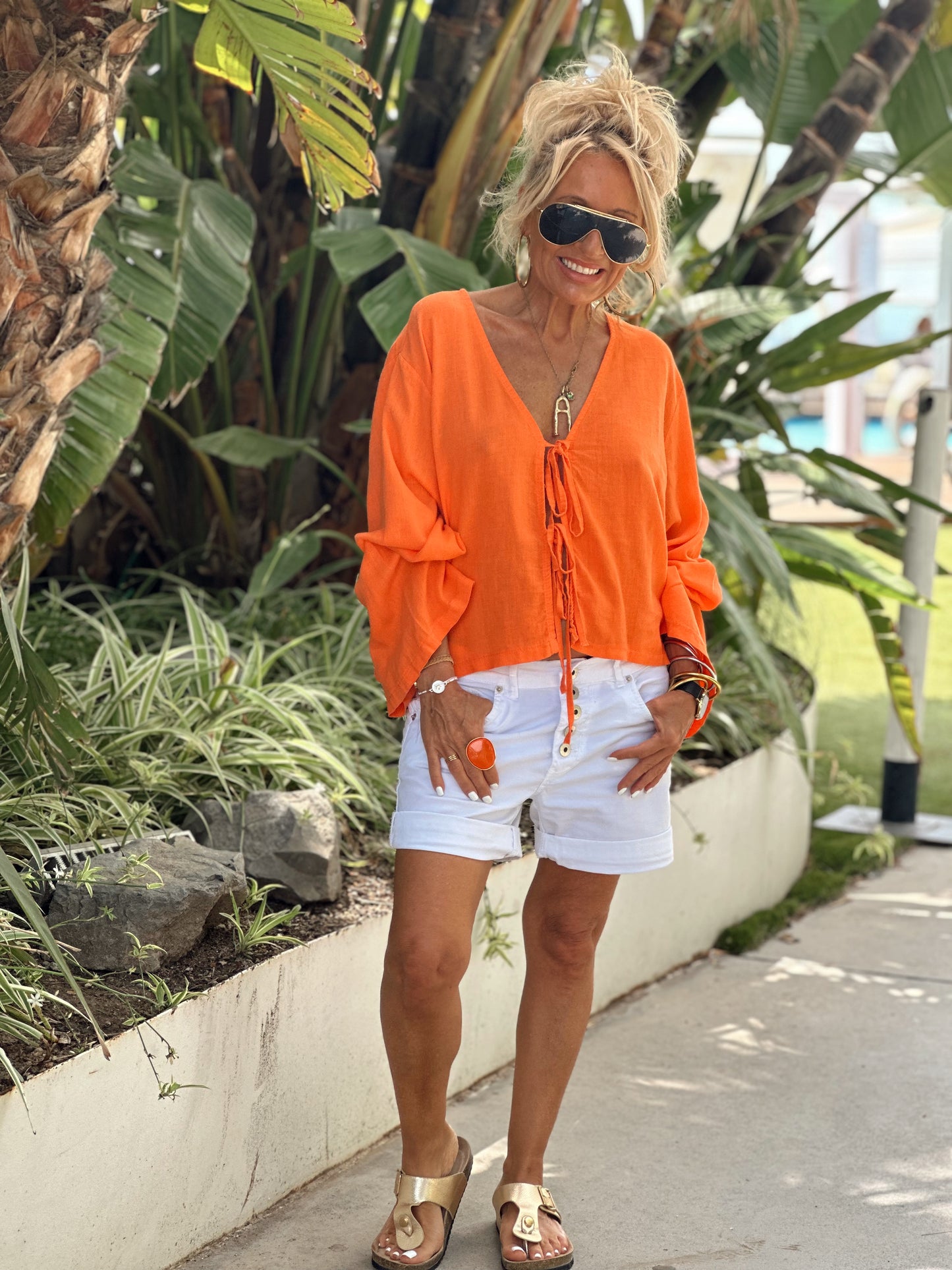 BLUSA CON LAZOS NARANJA