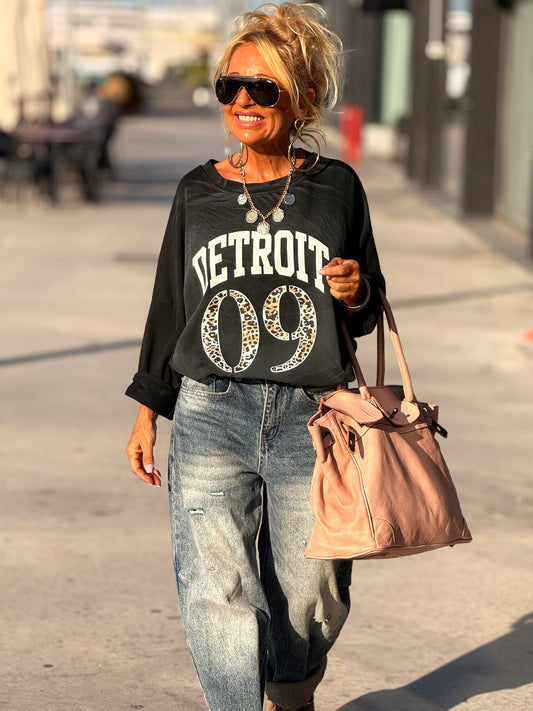 SUDADERA DETROIT ANIMAL PRINT NEGRO