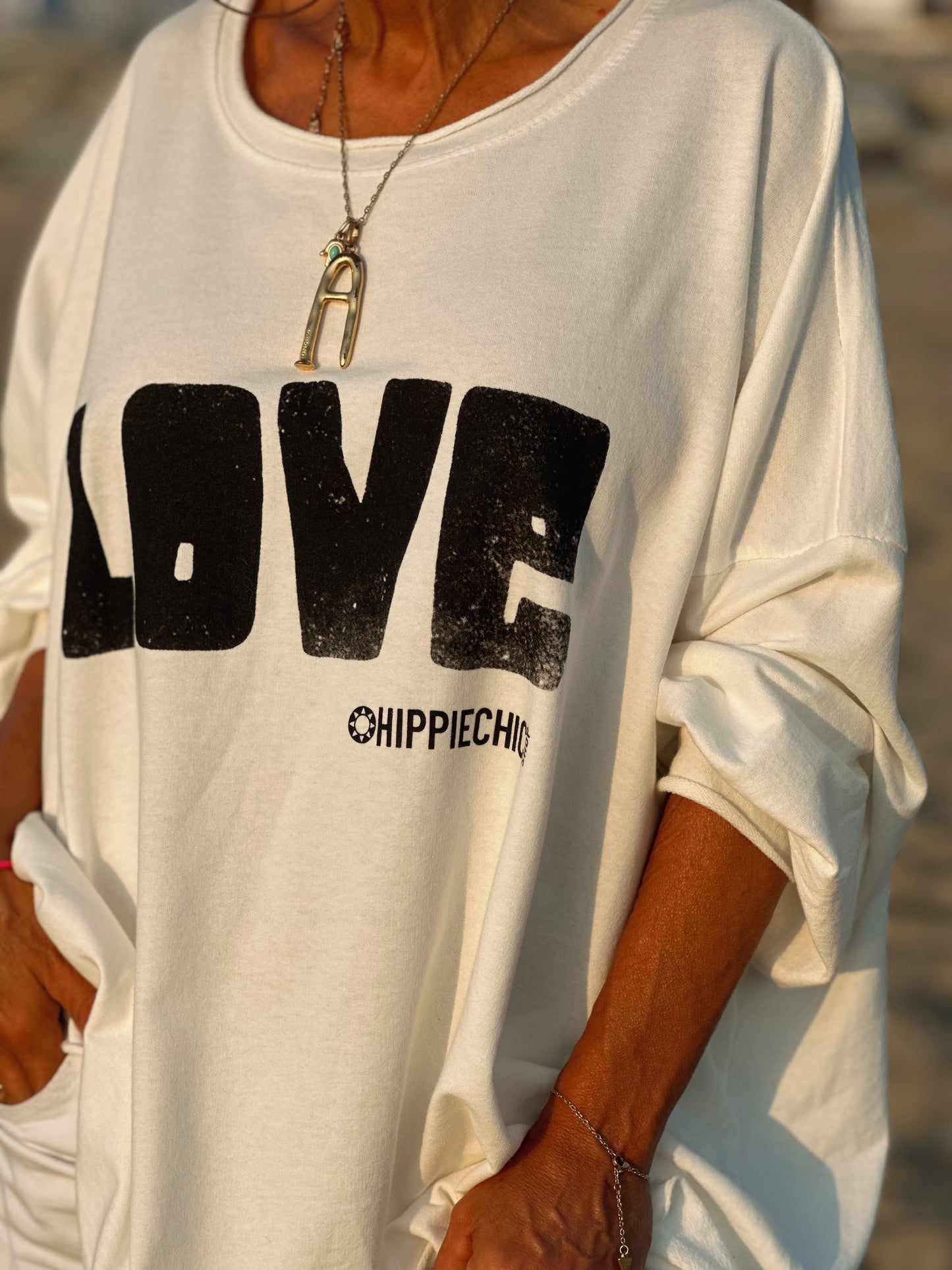 SUDADERA OVERSIZE LOVE BLANCO