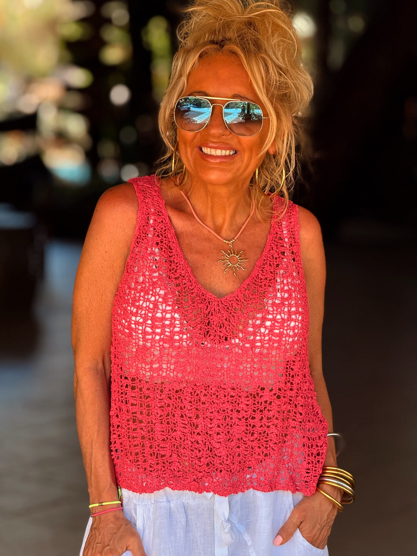 TOP AGUJEROS LUISA FUCSIA