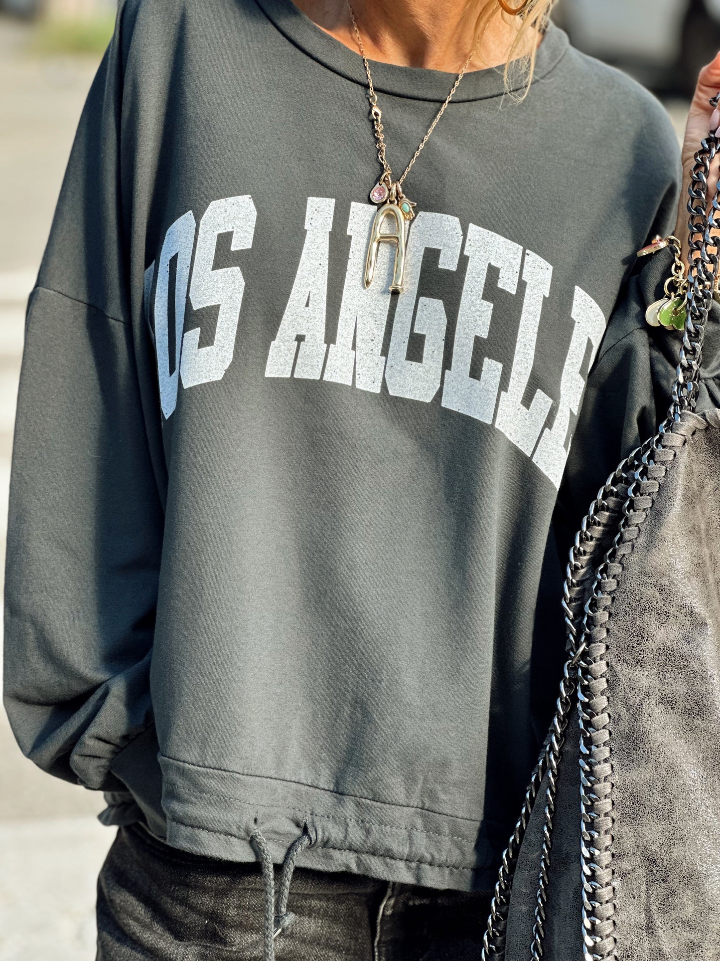 SUDADERA OVERSIZE CON CORDÓN LOS ANGELES GRIS