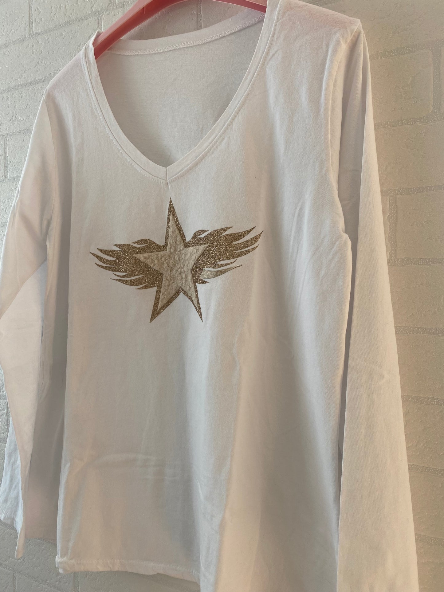 CAMISETA ESTRELLA CON ALAS